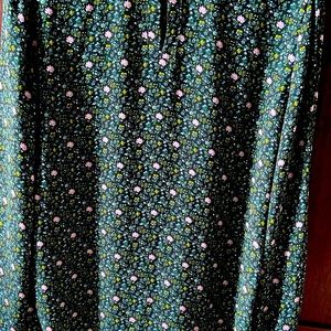 A beautifully flowy top from Loft, small size. Great for office wear.